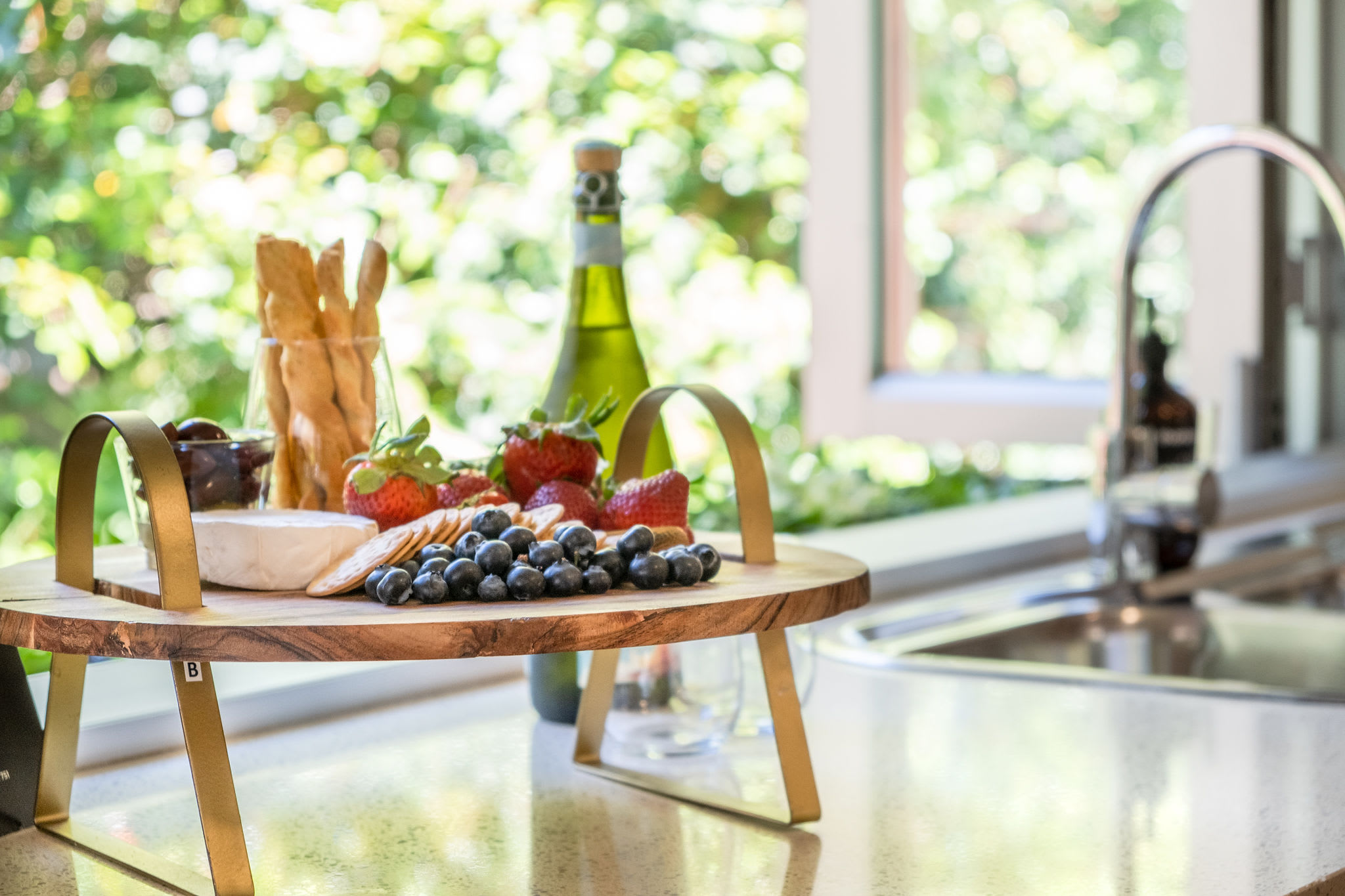 Take the time to sit back with some snacks and a glass of wine in the fresh air outside.